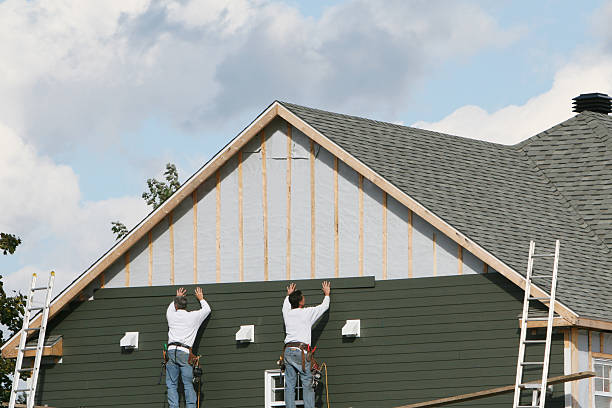 Professional Storm Damage Siding Repair technician working in Chesterland, OH